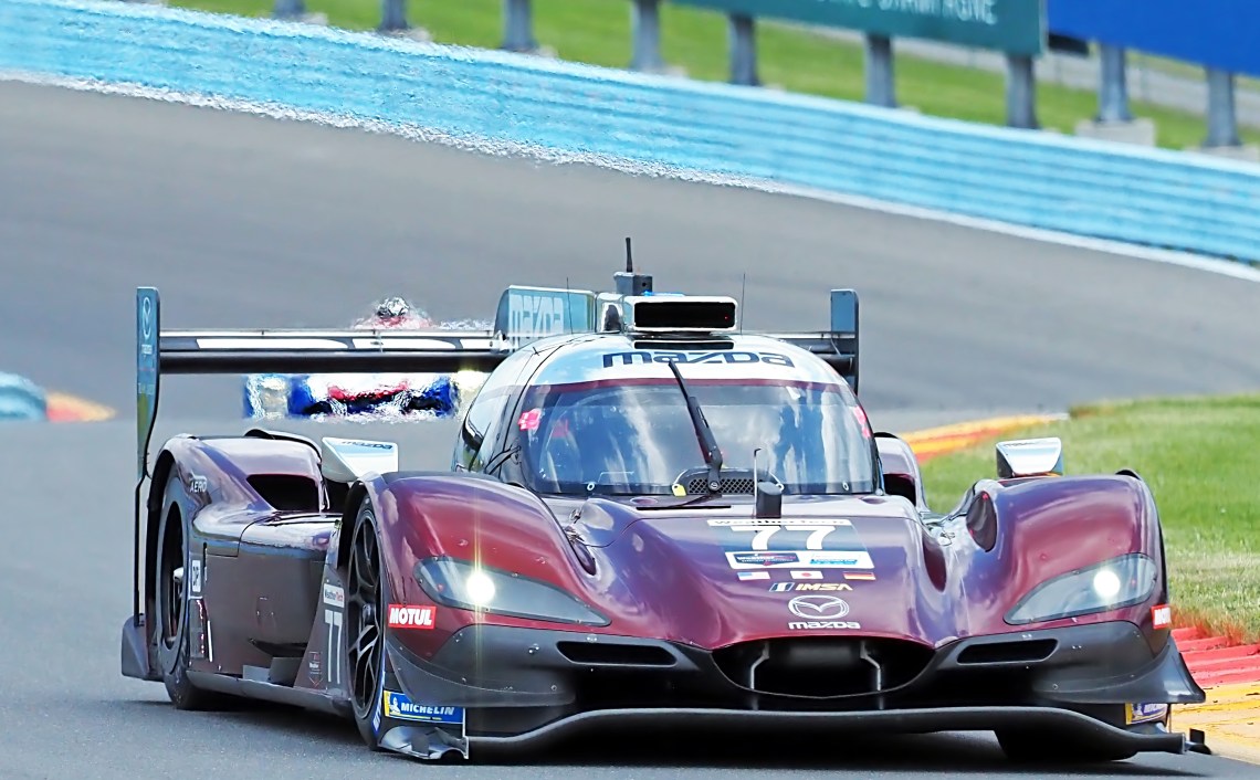 Mazda #77 warms up for qualifiying lap.