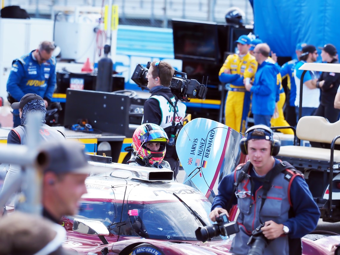 Mazda #77 Oliver Jarvis emerges.